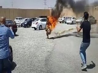 بهزاد محمودی , ایرانی کُرد پناهجو در اربیل خود را به آتش کشید