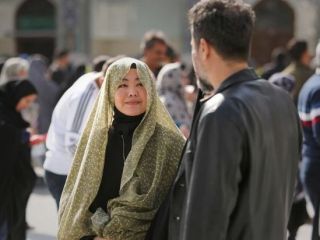(تصاویر) زن جوان تایلندی در حرم امام رضا شیعه شد